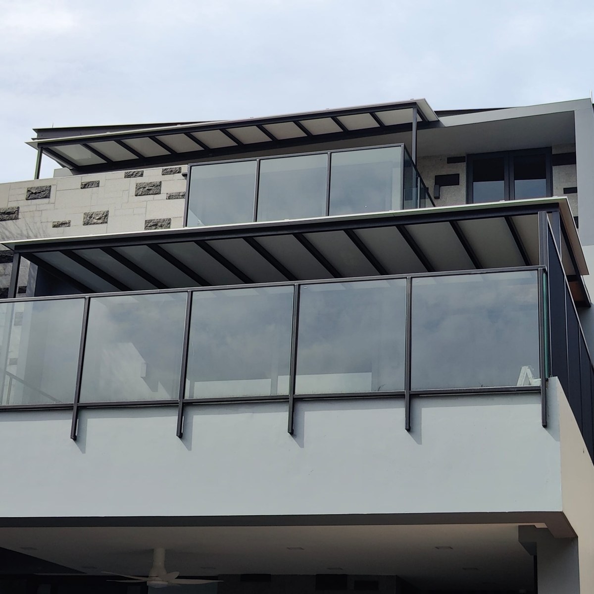 Roof extension over an outdoor area